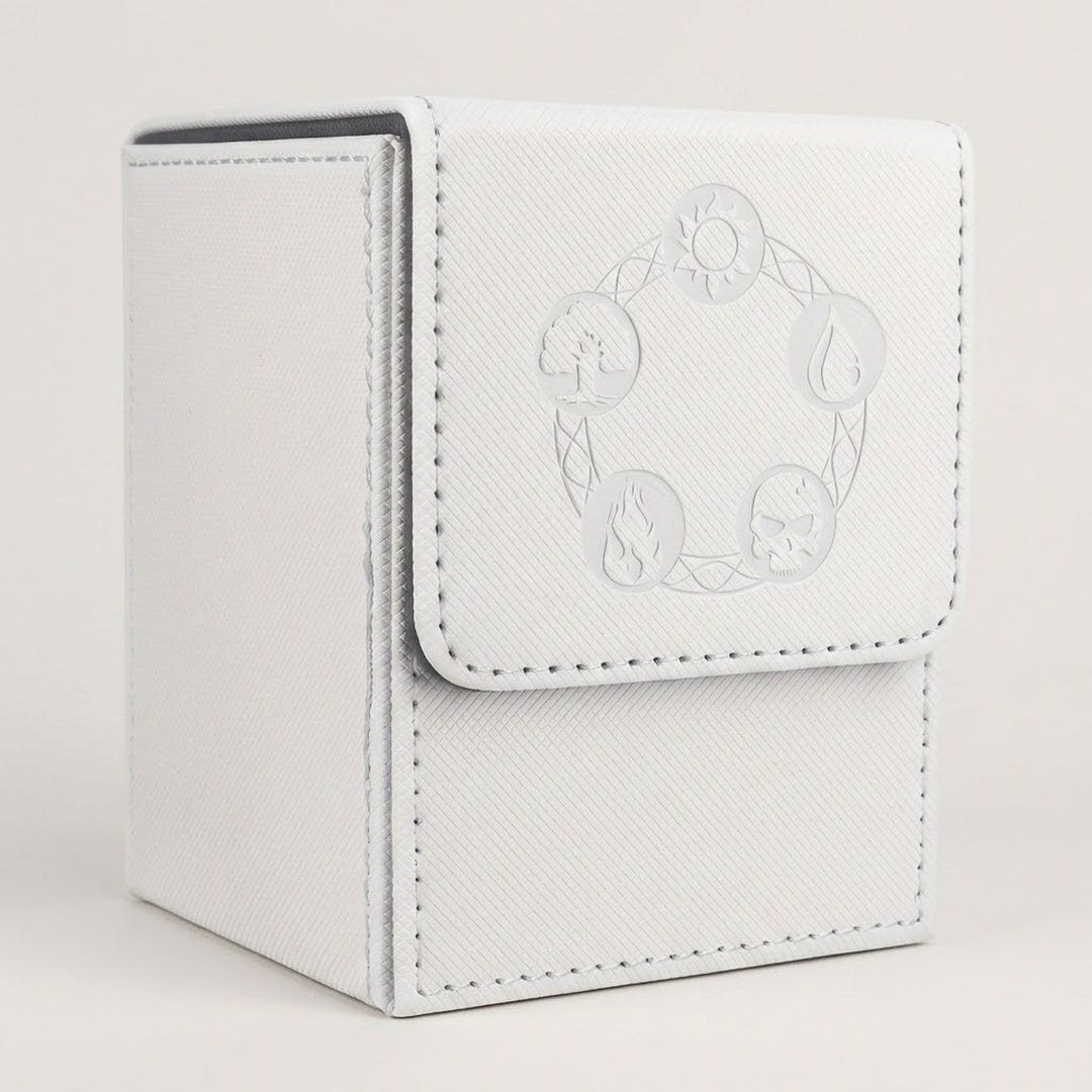 White textured card deck box with gray lining, stitched edges, and embossed circular symbols on its front flap against a pale background.