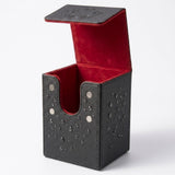 Open black deck box displays exterior water droplets, four silver magnetic contacts, and red velvet lining against a white background.