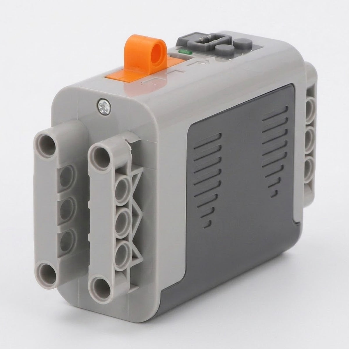 Gray plastic building block accessory AA battery case with an orange switch, dark gray side panel, and mounting holes on a white background.