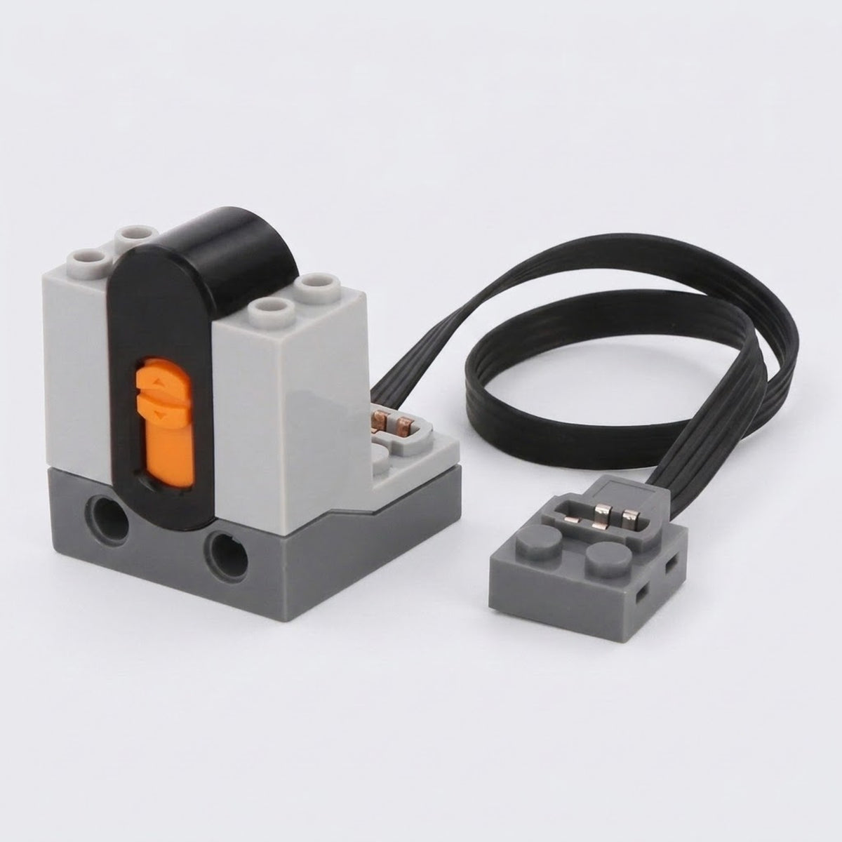 A LEGO-compatible electrical relay module with a black and gray plastic body, an orange switch, and a black wire connector, shown on a light gray background.