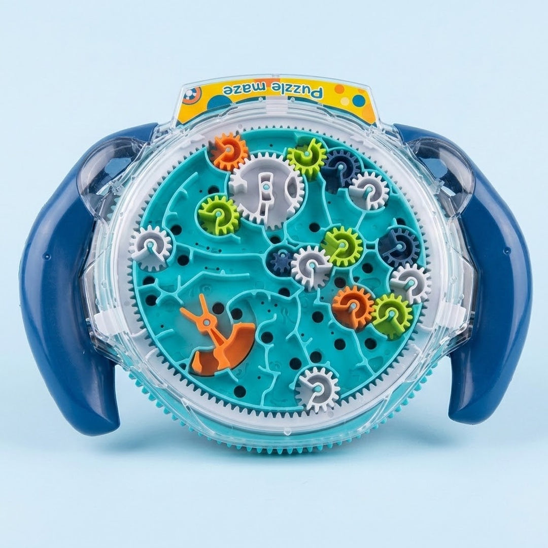 A children's toy puzzle maze with a circular clear plastic base, blue side handles, and colorful rotating gears on a light blue background.