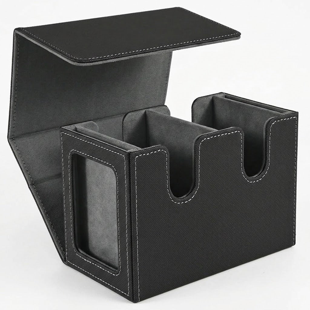 An open black-and-gray deck box with two empty compartments and a side display window stands against a white background.