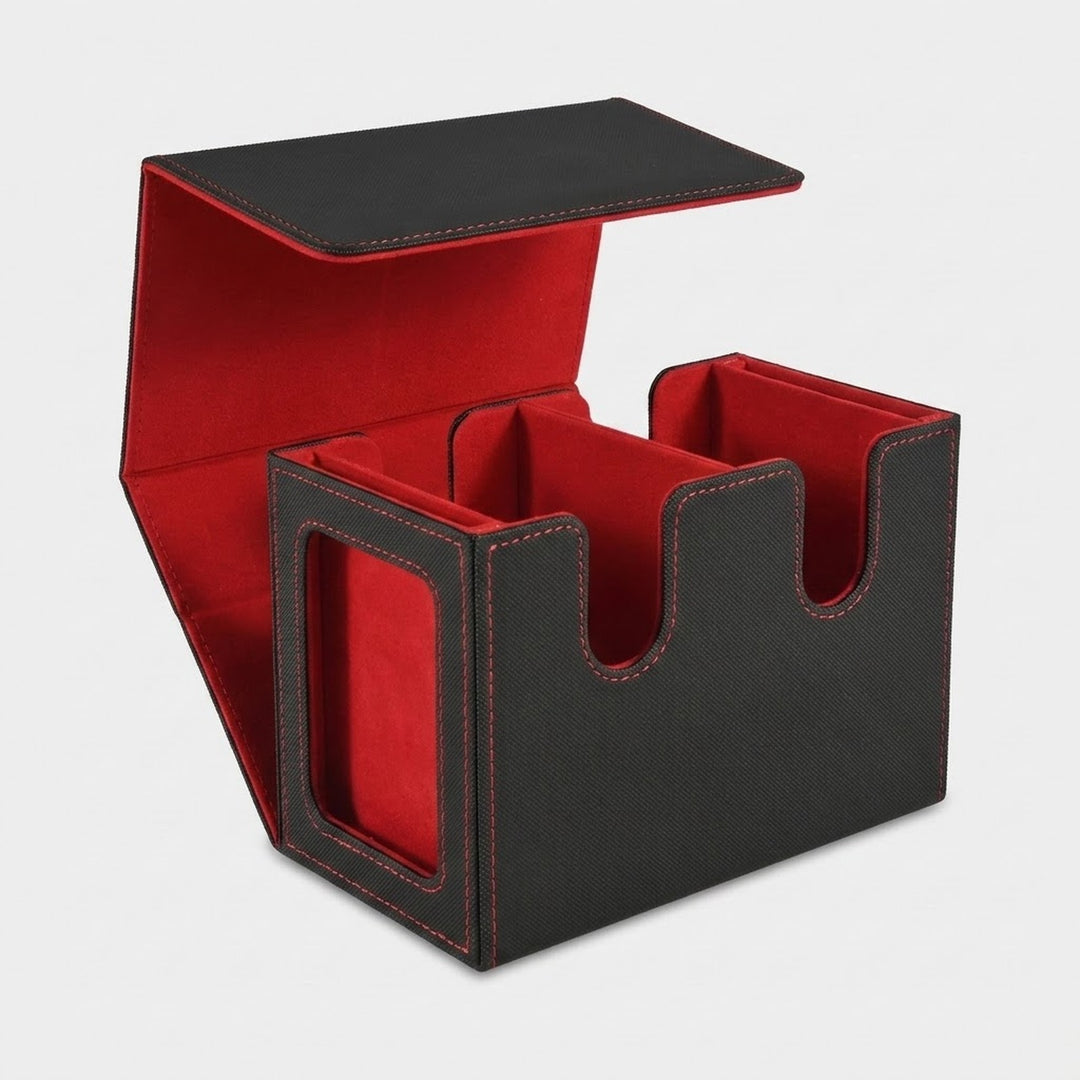Black textured deck box with red lining stands open on a white background, showing two compartments and a side display window.