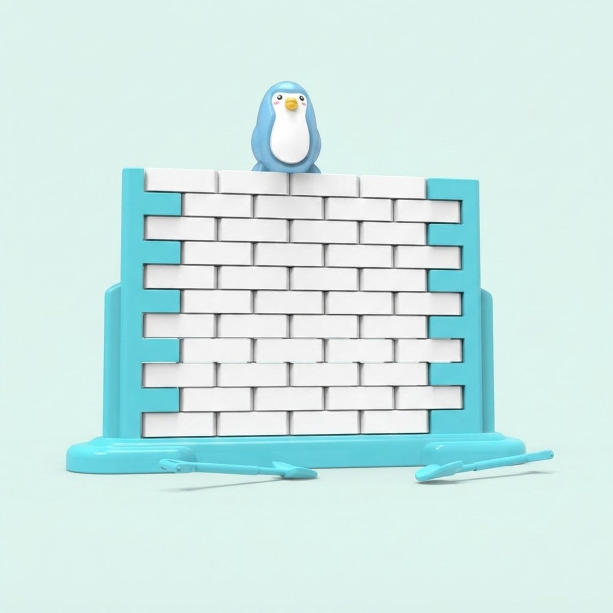 Set-of-3 penguin balance game with a blue penguin figure on a tall white block wall, turquoise base, and pale mint background.