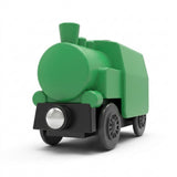 A green toy train engine with a black front and dark wheels, shown on a clean white background.