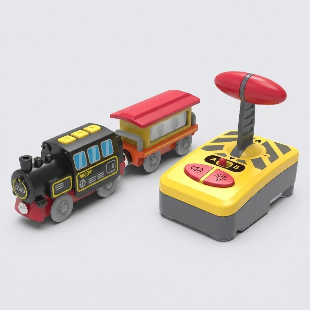 A toy train set with a black and yellow locomotive pulling a red and yellow passenger car, alongside a yellow and gray remote control with a red antenna on a light gray background.