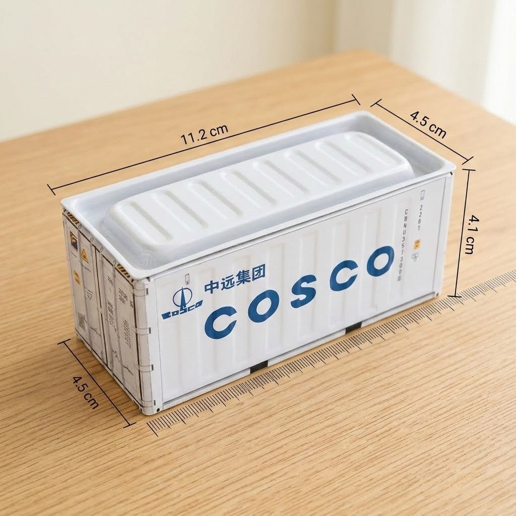 A white storage box sits on a wooden tabletop with size labels showing 11.2 cm length, 4.5 cm width, and 4.1 cm height.