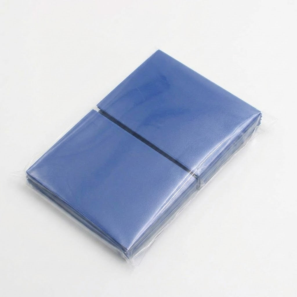 A stack of blue plastic sleeves or card protectors in clear plastic wrapping, photographed on a plain white background.
