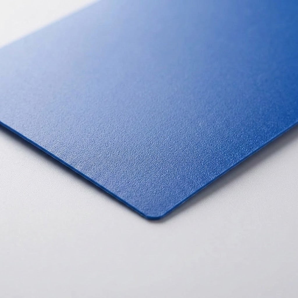 A blue polypropylene card sleeve shown close up, highlighting its matte texture and rounded corner against a light gray background.