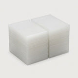 Two stacks of clear plastic card sleeves or protective cases, photographed on a clean light gray background.