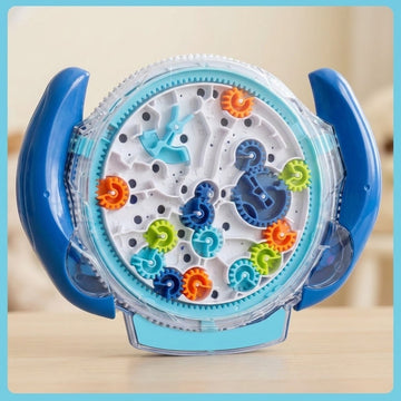 A transparent plastic maze puzzle with blue handles and colourful gears stands on a wooden tabletop within a turquoise border.