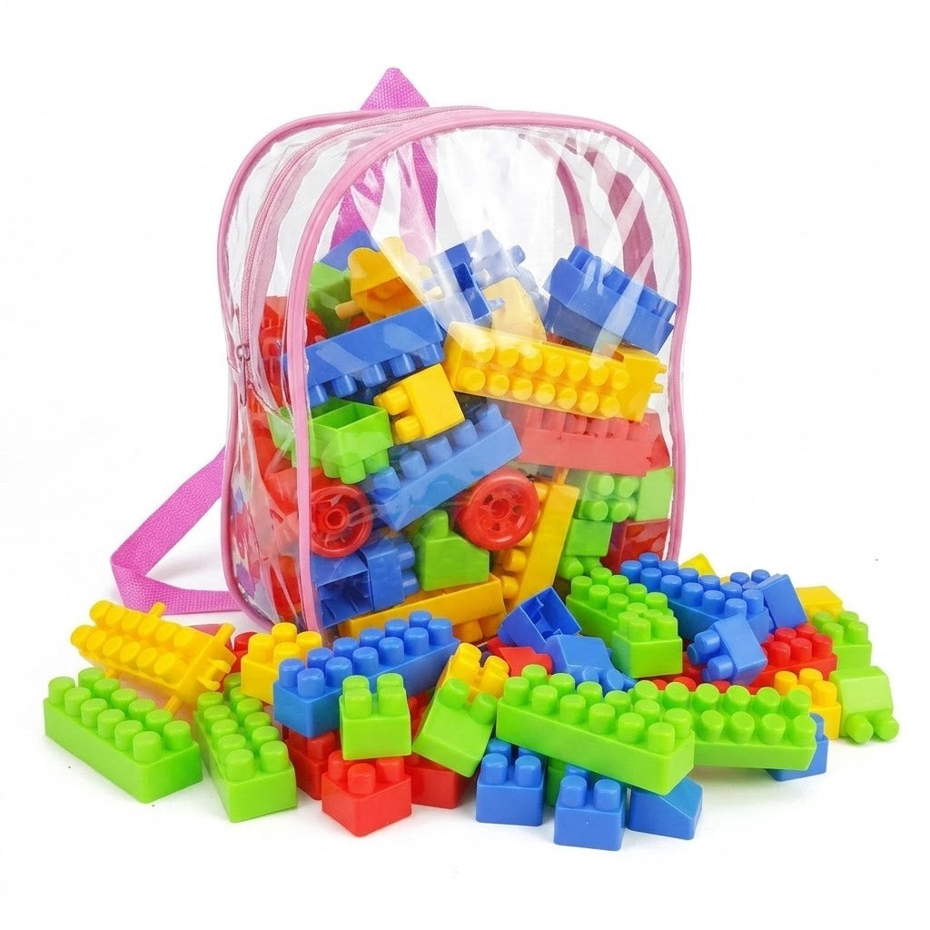A clear plastic backpack with pink trim and straps, filled with and spilling out colorful building block toys on a white background.