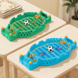 Green and blue tabletop soccer games, each with yellow controls and a black-and-white ball, displayed on separate pale wooden tables.