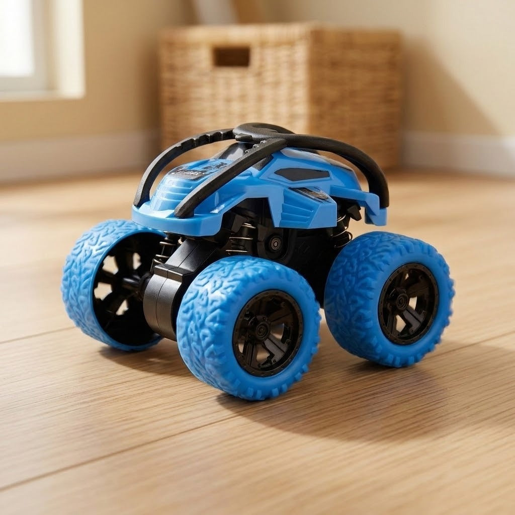 Blue and black toy car with oversized blue wheels sits on a wooden floor with a woven basket behind it.
