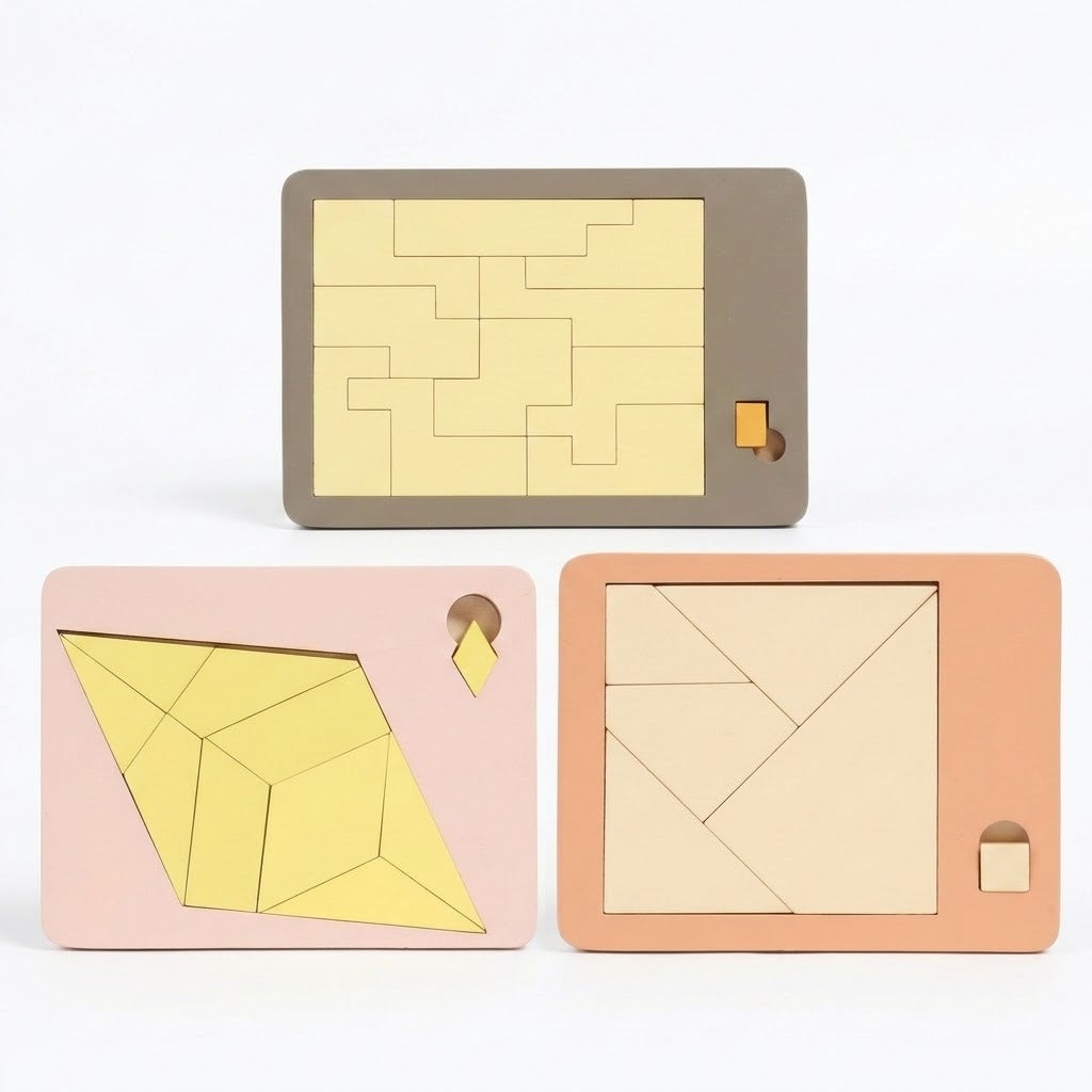 Three wooden geometric puzzle designs show interlocking, diamond and square arrangements in grey, pink and peach trays against a white background.