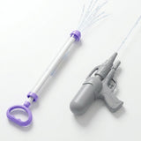 A clear and purple pull-out water gun spraying several jets beside a gray water gun spraying one stream on a white background.