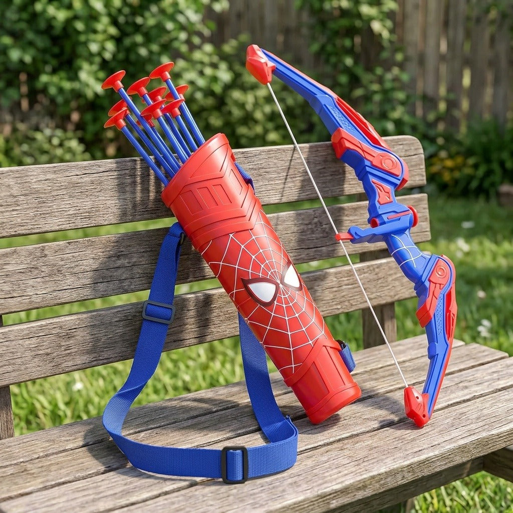 A Spider-Man-themed toy archery set on a wooden bench in a garden setting, featuring a red and blue quiver with arrows, a red and blue bow, and a blue strap.