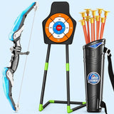 A toy archery set on a light blue background, including a blue and gray bow, a black target stand with an orange and blue target, a black quiver with orange arrows, and a visible 'Super Archery' logo on the quiver.