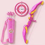 Pink and yellow toy bow and arrow set with a matching pink quiver carrying five arrows, shown on a light pink background. The quiver has a circular 'SUPER ARCHERY' logo.