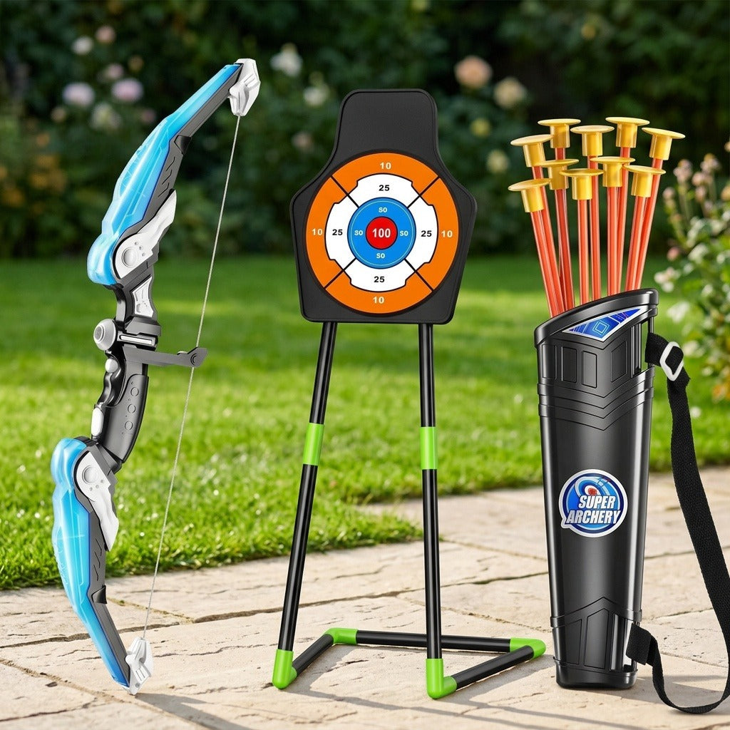 A toy bow and arrow set displayed outdoors on a stone patio with grass and flowers in the background. The set includes a blue and gray bow, a black target stand with an orange and white target, a black quiver holding orange arrows with gold tips, and a Super Archery logo on the quiver.