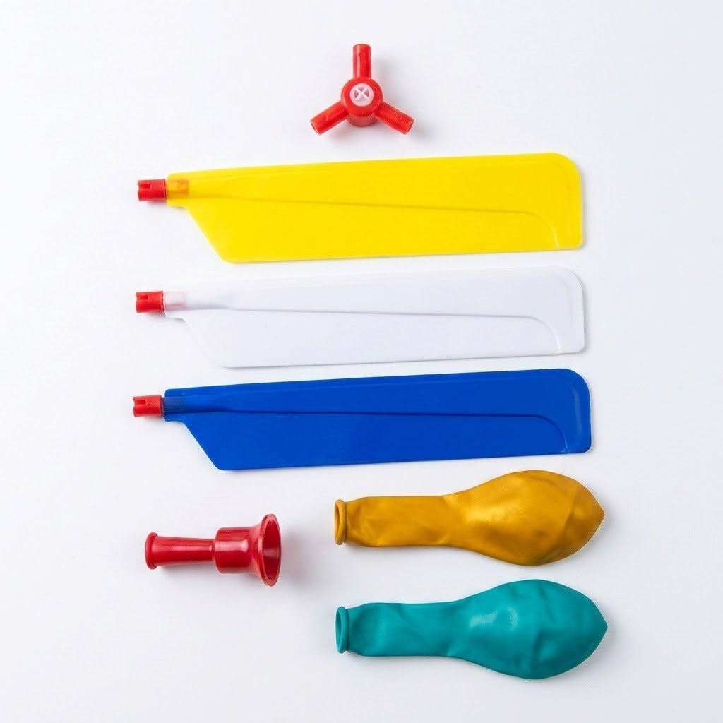 Balloon helicopter set components include yellow, white and blue plastic blades, red connectors and two deflated balloons on a white background.