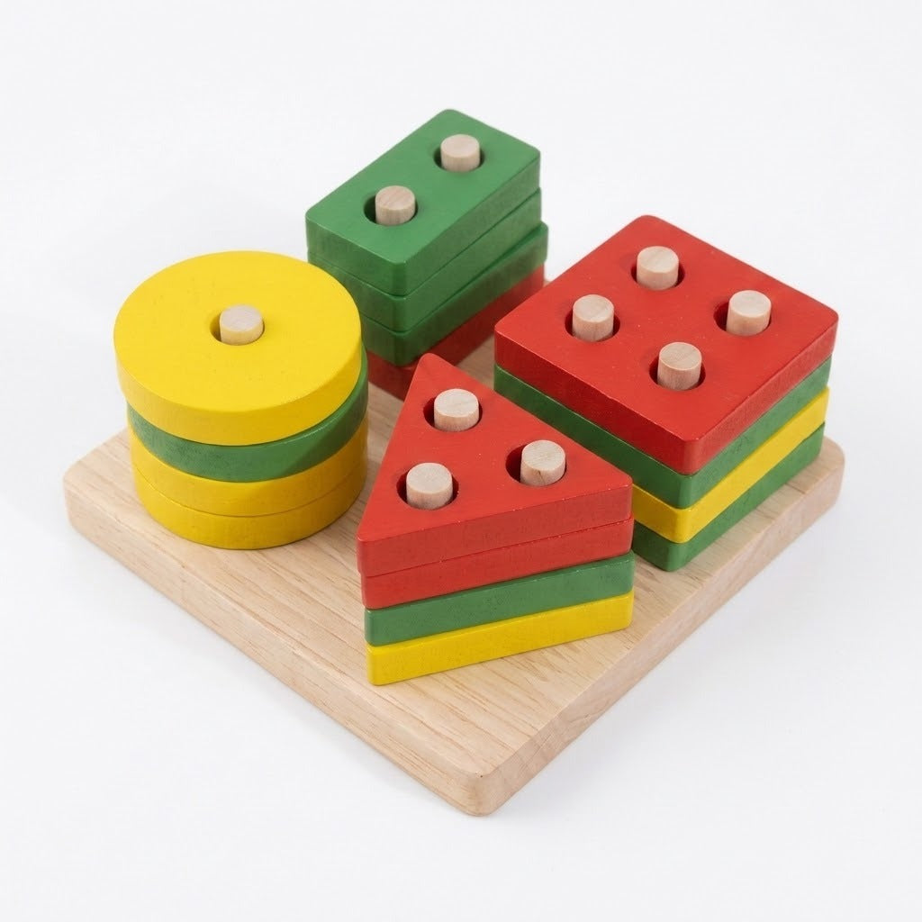 A wooden Montessori shape and size sorting toy set on a light natural wood base, featuring yellow and green circular discs and red, green, and yellow triangular and square blocks with peg holes.