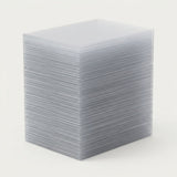 Clear plastic card sleeves form a tall, neatly aligned stack on a white studio background.