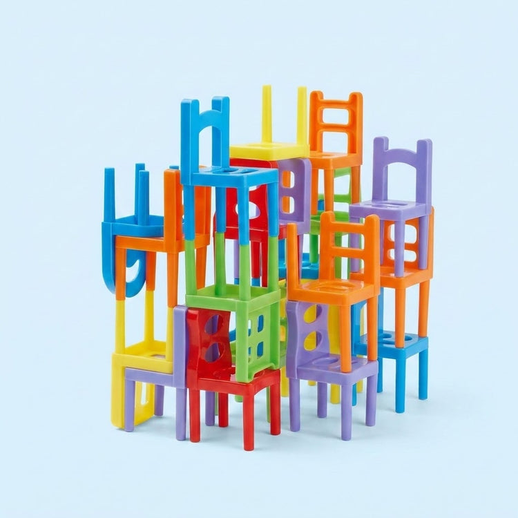 Chair stacking game with multicoloured plastic pieces balanced upright and upside down in compact towers against a pale blue background.