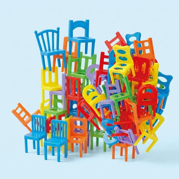 Chair stacking game with multicoloured plastic pieces featuring varied backrests, arranged in a wide, irregular pile against a pale blue background.