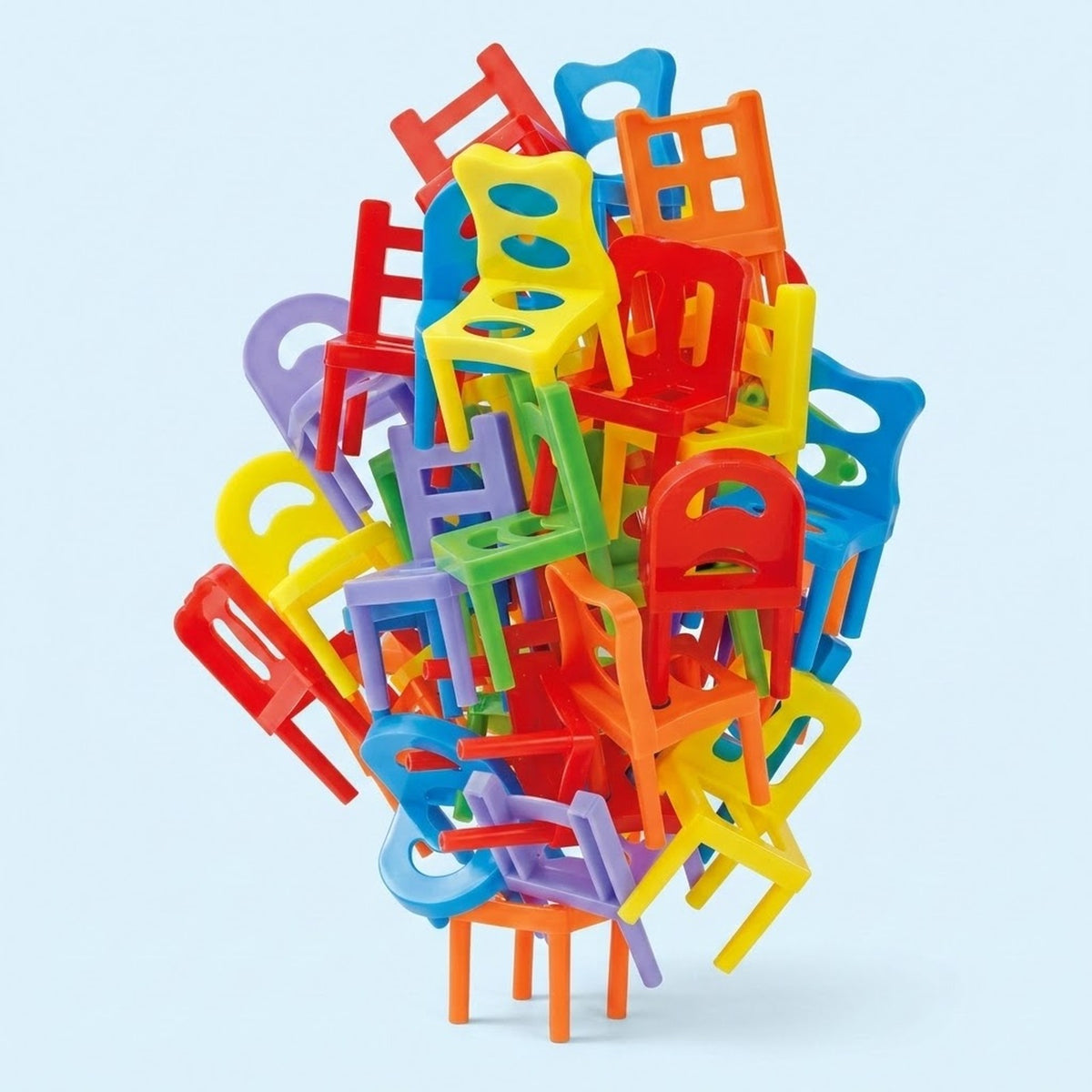 Chair stacking game with multicoloured plastic pieces featuring varied backrests, balanced in a tall, irregular tower against a pale blue background.