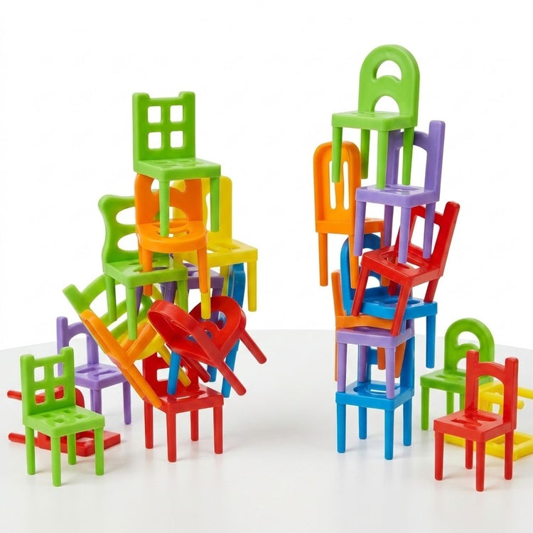 Colorful plastic chair pieces from a stacking game form two uneven towers with loose pieces around their bases on white.