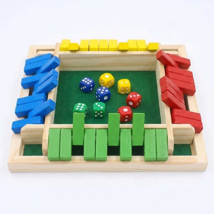 A four-player wooden shut the box game with colorful flaps and colored dice on green felt, shown against a plain white background.