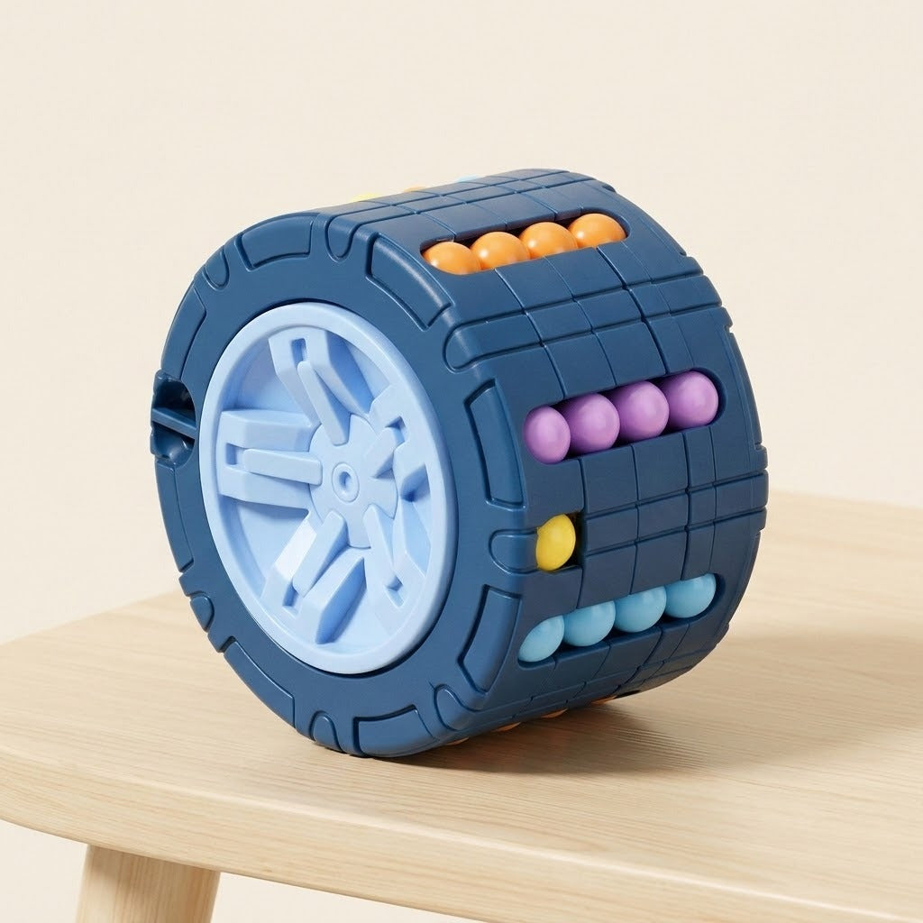 Blue cylinder fidget puzzle with orange, purple and turquoise bead rows and one offset yellow bead on a wooden surface.