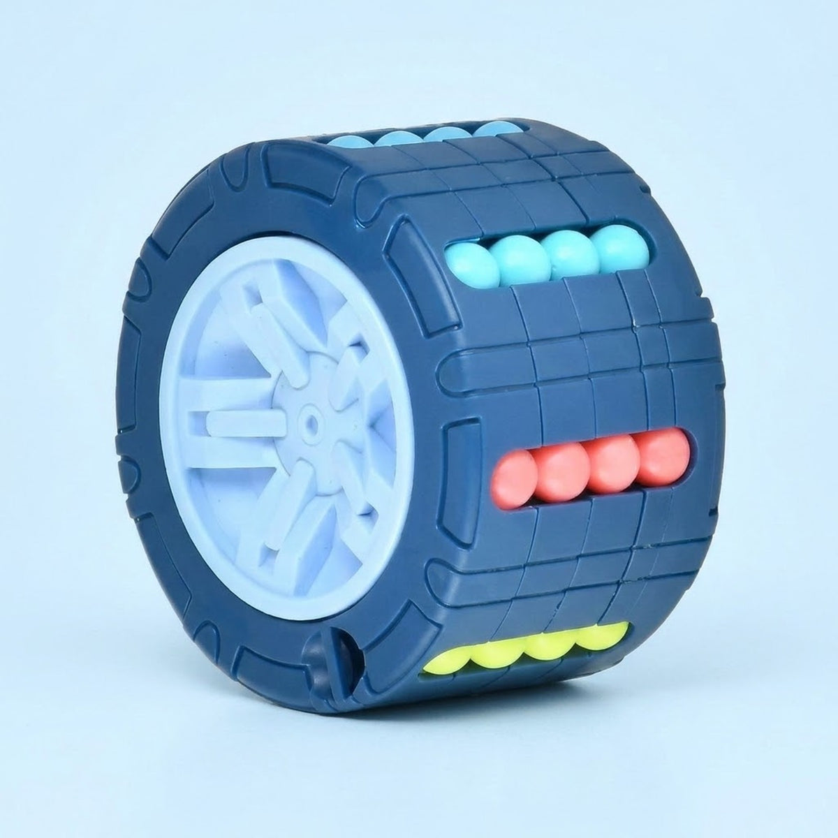 Blue cylindrical fidget puzzle with a pale blue center and turquoise, coral, and yellow beads on a light blue background.
