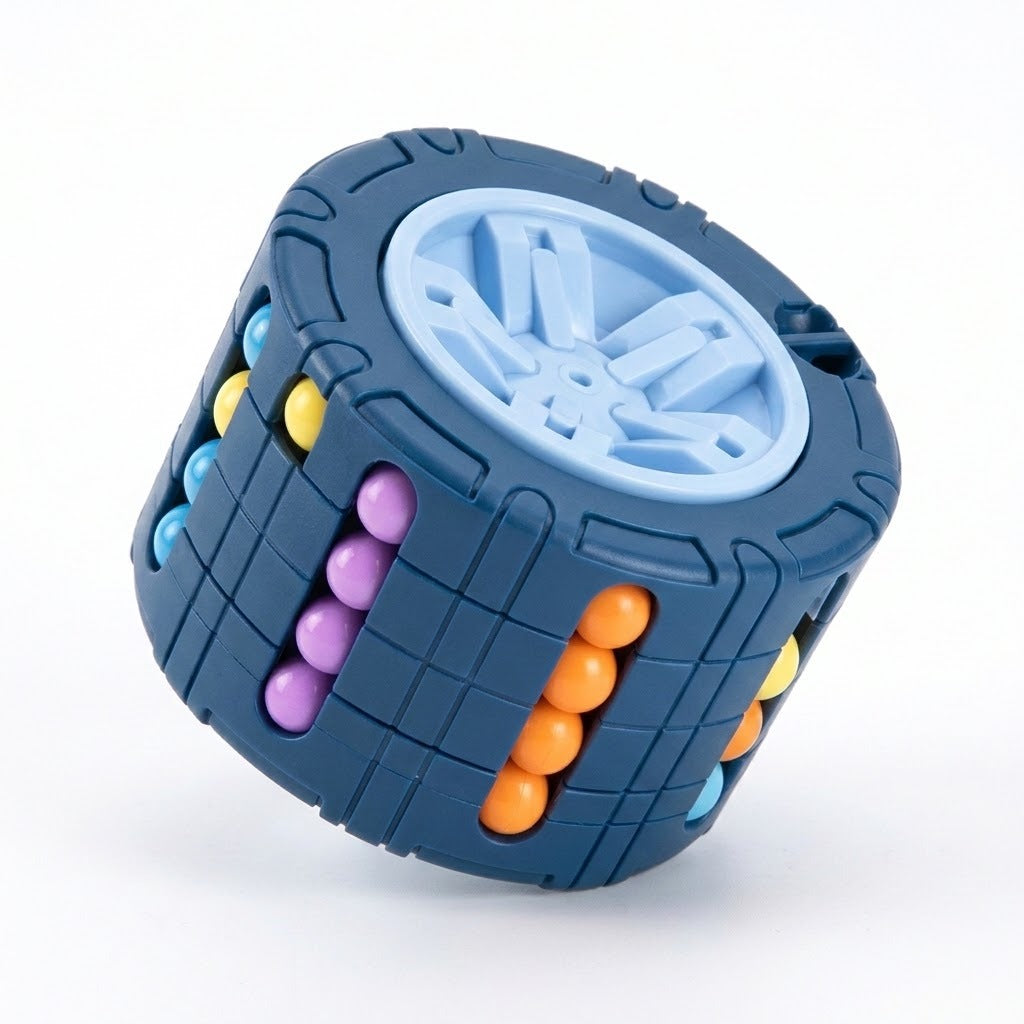 Blue cylinder fidget puzzle tilted on a white surface, showing its pale blue wheel end and purple, orange and turquoise beads.