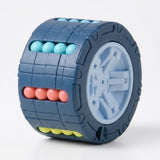 Blue cylindrical fidget puzzle with a pale blue center and turquoise, coral, and yellow beads on a white background.