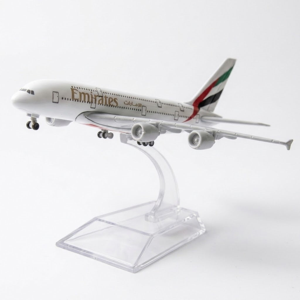 White model airplane with landing wheels extended on a curved clear stand against a white background.