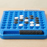 Blue plastic reversi game on a wooden table, with black and white discs on the board and upright discs in storage slots.