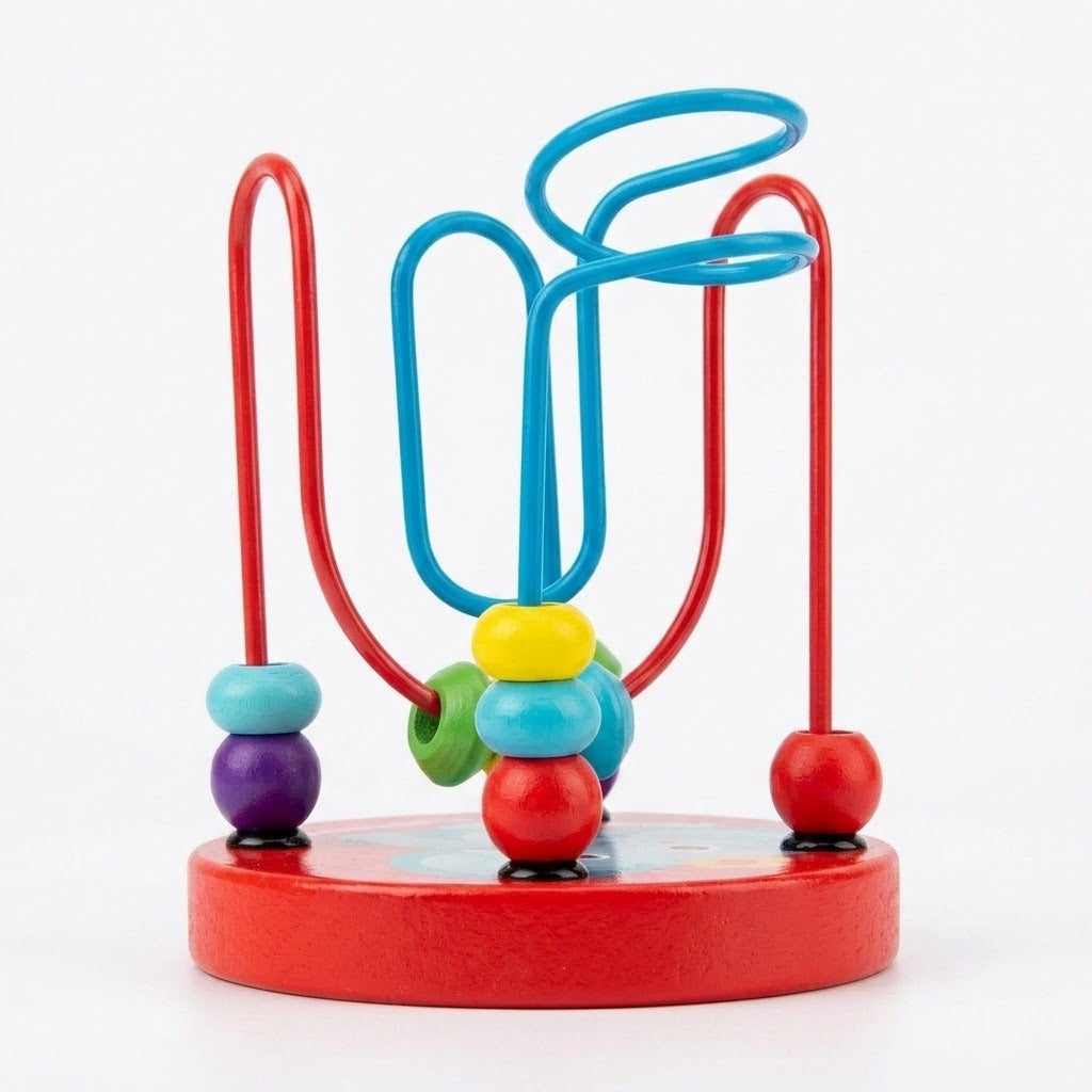 Bead maze learning toy with colorful wooden beads and looping turquoise and red wires on a round red base against white.