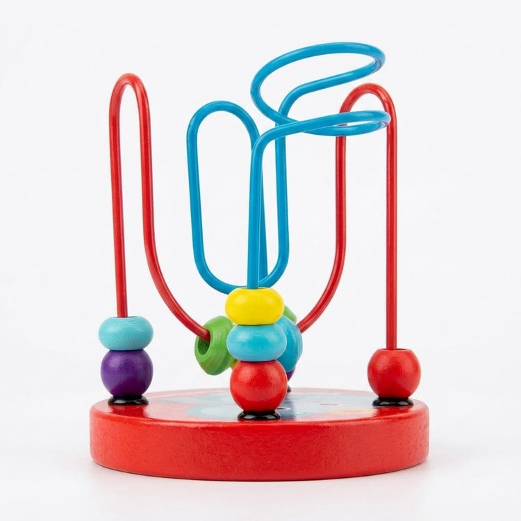 Bead maze learning toy with colorful wooden beads and looping turquoise and red wires on a round red base against white.