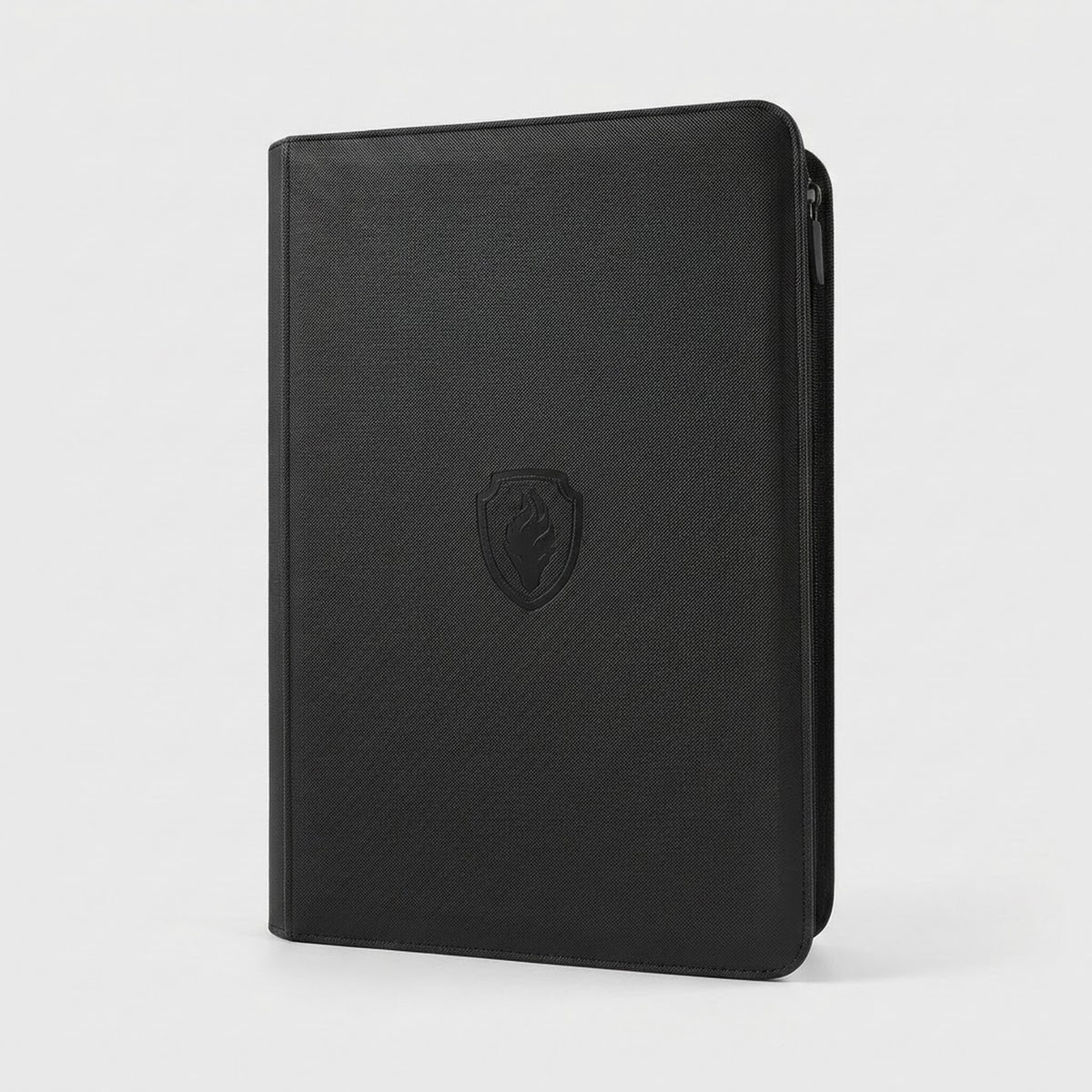 A black trading card binder with a textured PU cover and closed zipper stands upright against a light gray background.