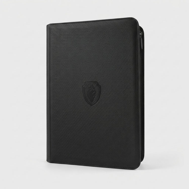 A black trading card binder with a textured PU cover and closed zipper stands upright against a light gray background.