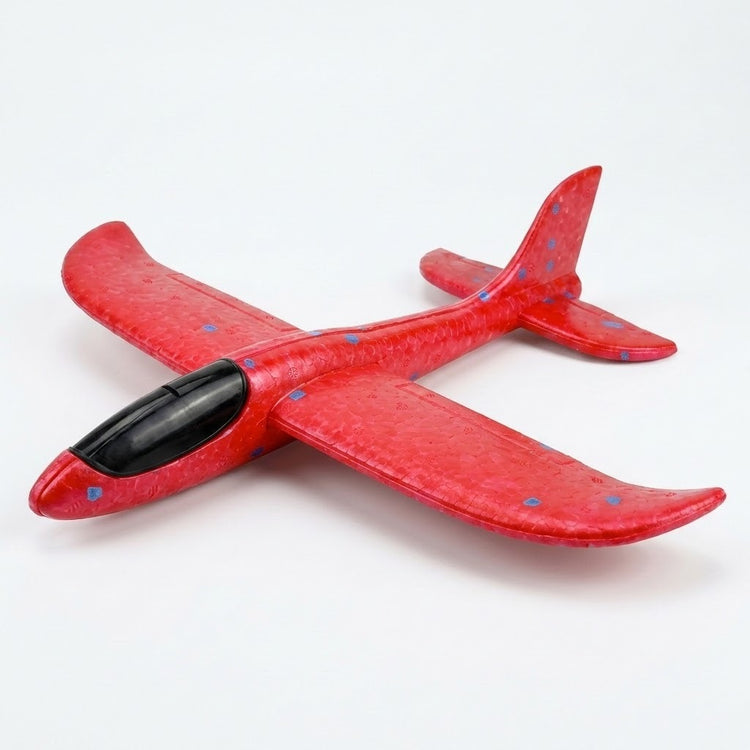 Red foam glider option for an airplane launcher toy, with blue flecks and a black cockpit, displayed against a white background.