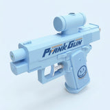 A light blue water gun with a cylindrical top attachment and white trigger stands against a pale blue background.