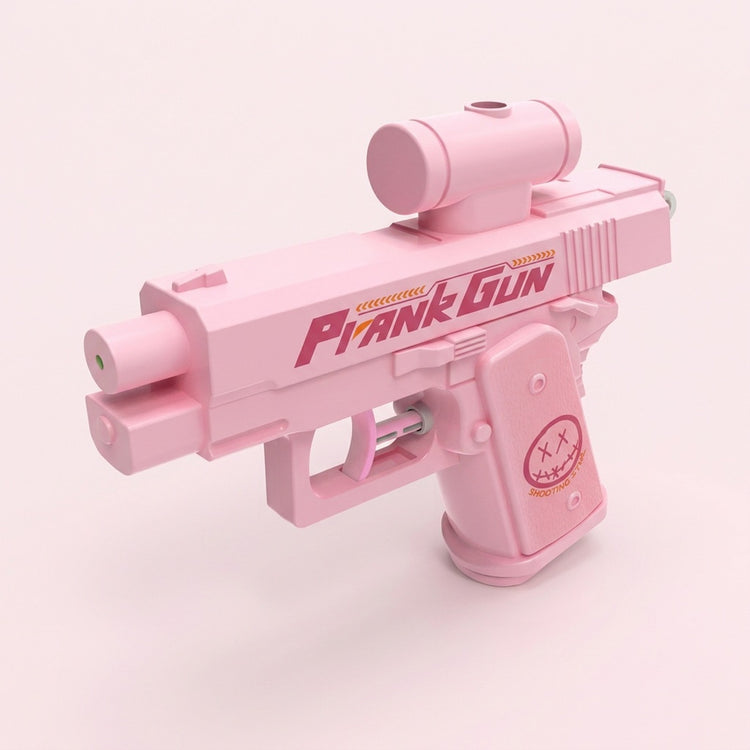 A pink water gun with a cylindrical top attachment and curved trigger stands against a pale pink background.