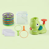 A green elephant-shaped disc launcher set includes stacked colorful discs, net components, and a clear face shield against a pale green background.