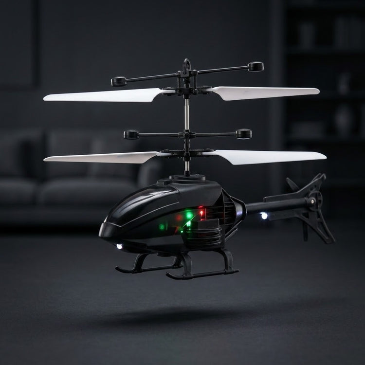 A black remote control toy helicopter with white rotors and illuminated green and red indicator lights, shown hovering against a dark, blurred indoor background.