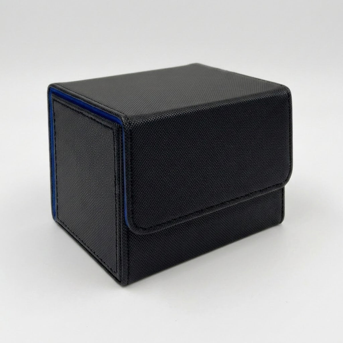 A black textured deck box with blue edge trim and a closed front flap sits on a light gray background.