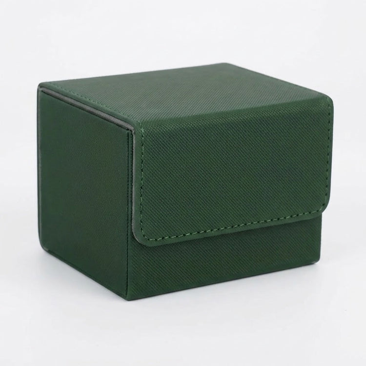 A dark green textured deck box with a closed stitched front flap sits on a white background.