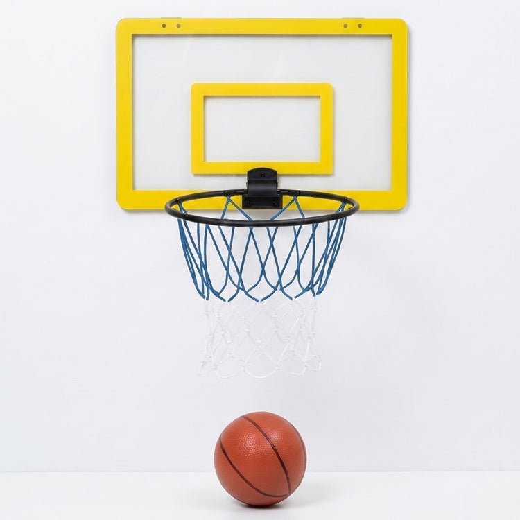 A wall-mounted mini basketball hoop with a yellow backboard, black rim, blue net, and a small orange basketball below, shown against a plain white wall and floor.